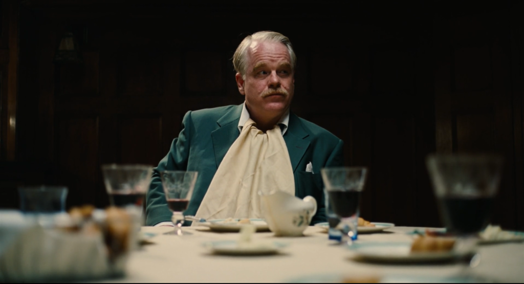 Phillip Seymour Hoffman as Lancaster Dodd