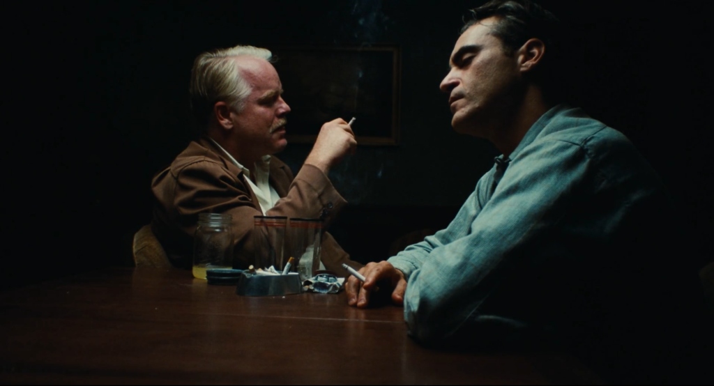 Joaquin Phoenix and Phillip Seymour Hoffman smoking in The Master